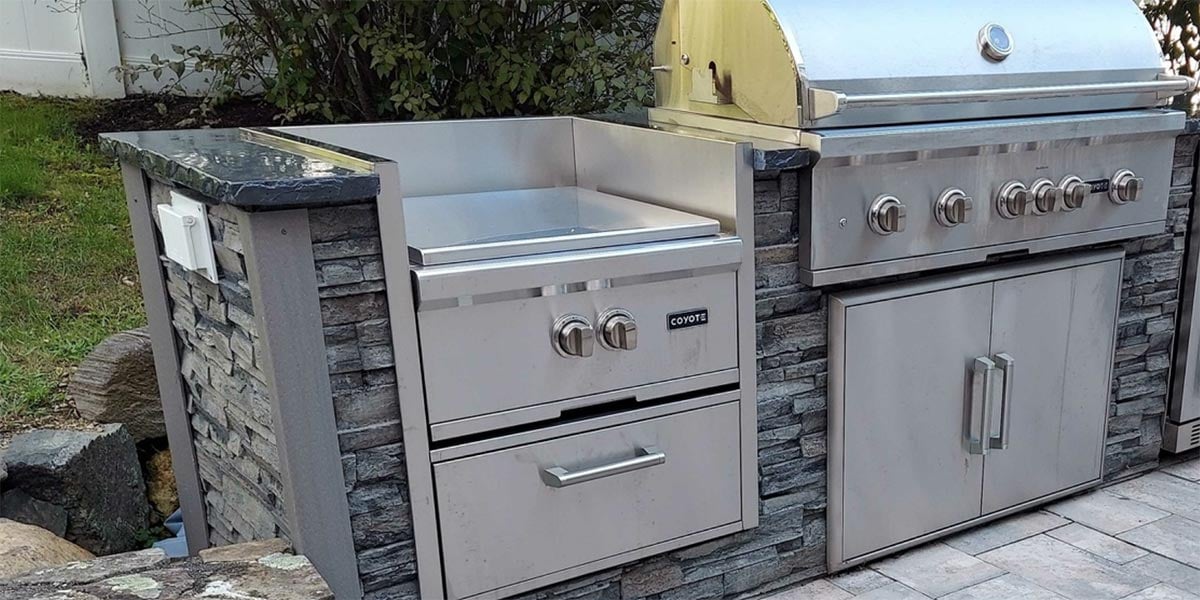 coyote power burner in outdoor kitchen island
