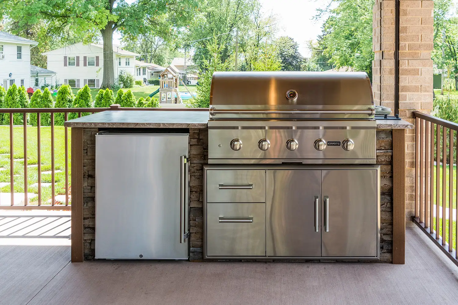 straight outdoor kitchen island with combo storage on deck